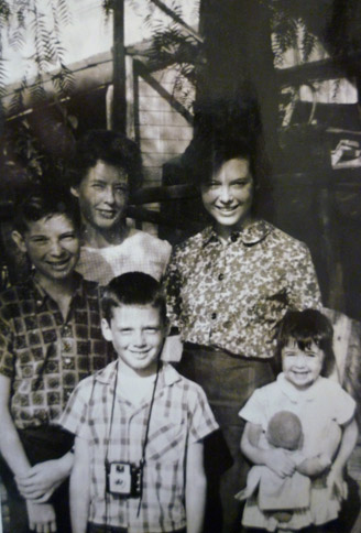 Yours truly, with my first camera, about 9 years old